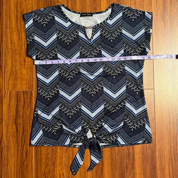 Sleeveless blue blouse - Picture 1 of 6